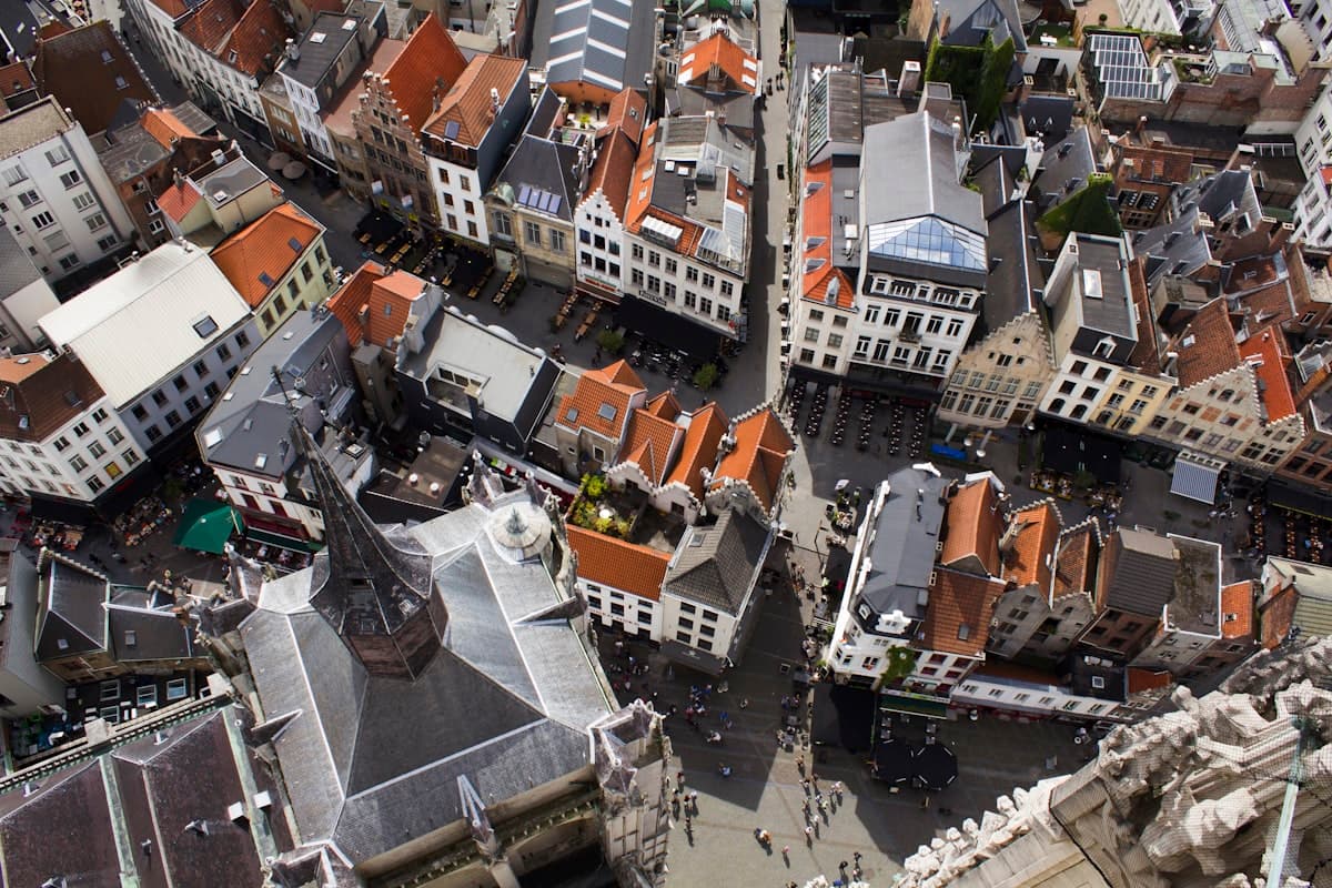 A European city street with trams, shops and pedestrians
